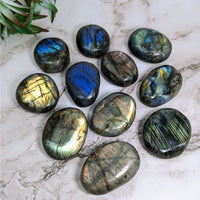 Thumbnail for Close-up of multi-colored palm stones for sale, featuring Labradorite #LV4216