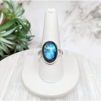 Thumbnail for Close-up of Labradorite Polished Oval S.S. Ring #LV5116 with a blue stone on a white pedestal