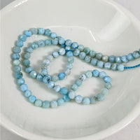 Thumbnail for Larimar Faceted 3 mm Bead 12 Pack #LV3614: Blue Necklace on White Plate