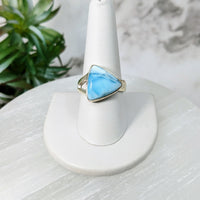 Thumbnail for Larimar Sz. 9 S.S. Triangle Ring #LV5037: Blue Stone Ring on White Pedestal