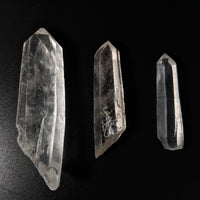 Thumbnail for Three Lemurian Quartz Rough Points on black background - Product #LV1645