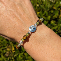 Thumbnail for Handmade Leo Zodiac Bracelet with Blue and Yellow Glass Bead - 7’ Astrology Sign Jewelry