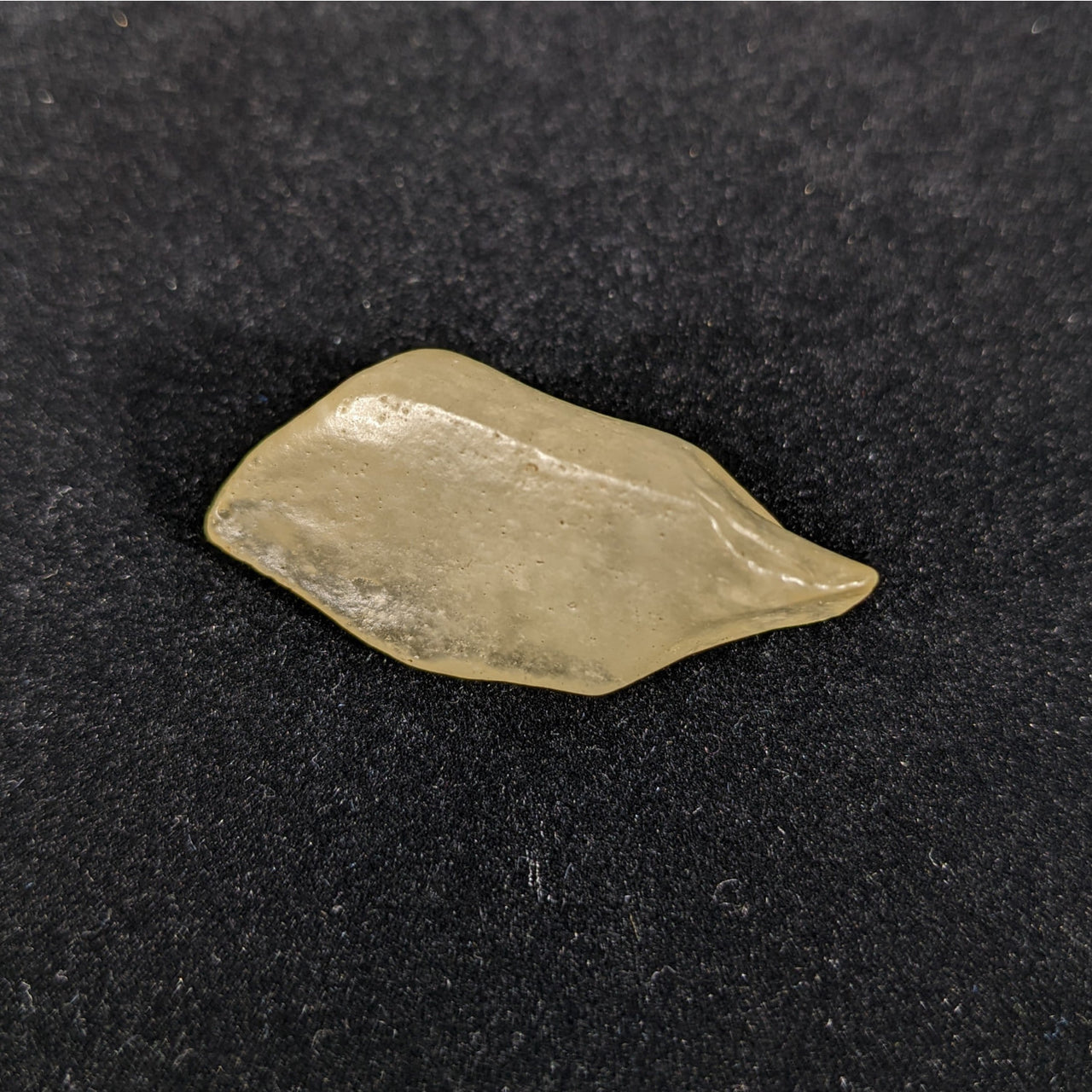 Libyan Desert Glass Rough #R215 - Yellow Quartz on Black Background for Sale