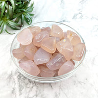 Thumbnail for Bowl of Luna Rose Quartz A+ tumbled stones on marble counter #LV4975