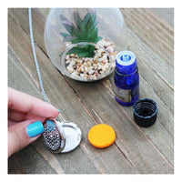 Thumbnail for Hand holding Mandala Aromatherapy Essential Oil Diffuser Necklace #P001389 gift box