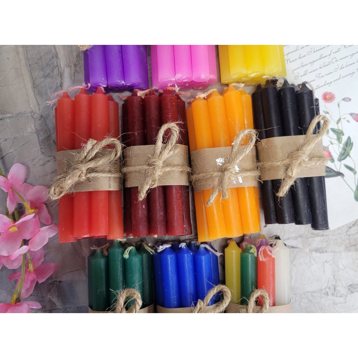 Mini Taper 10 Pack Spell Candle #LV3767 – A bunch of colorful candles tied with a string