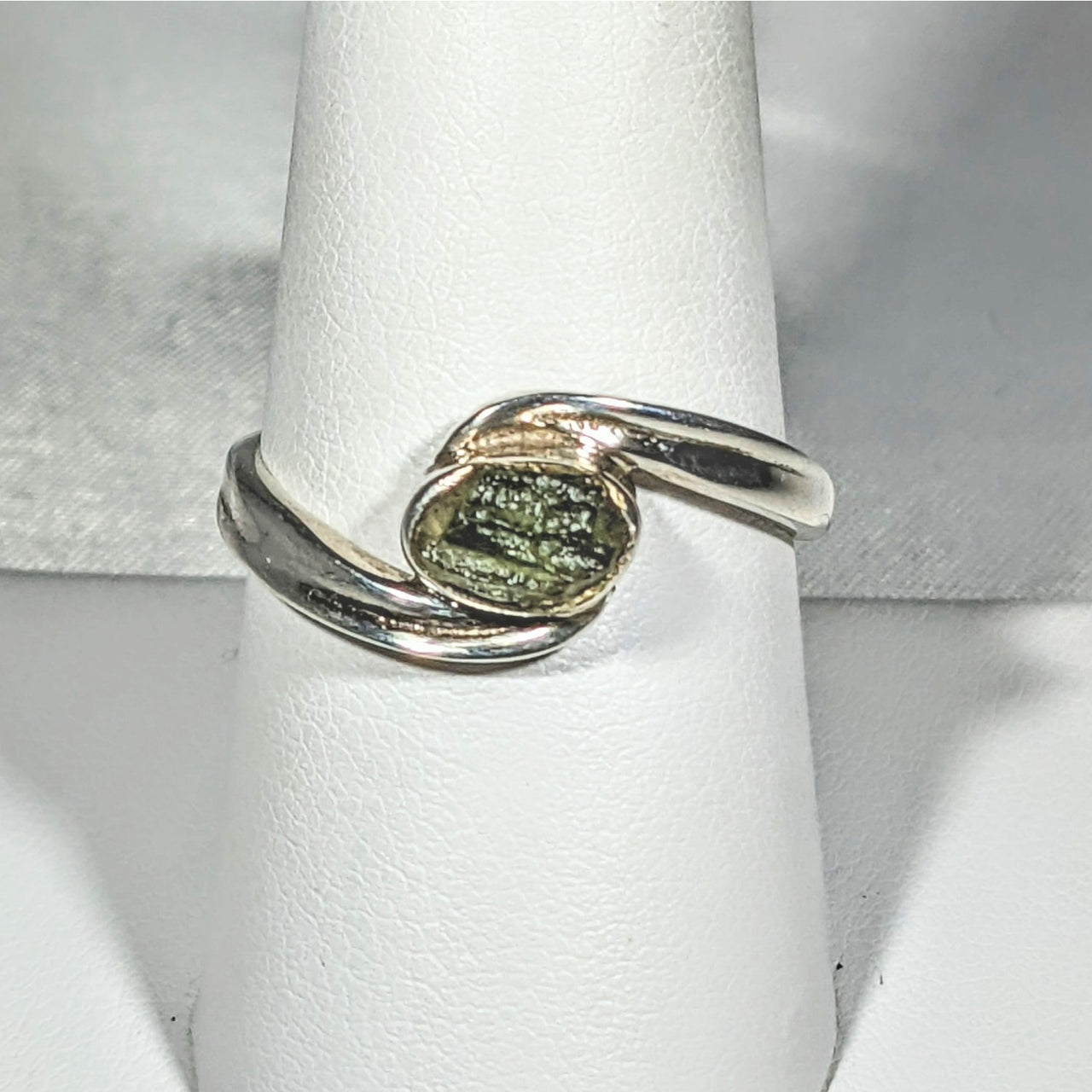 Moldavite Sterling Silver Swoop Ring #SK2626 with a striking green gemstone