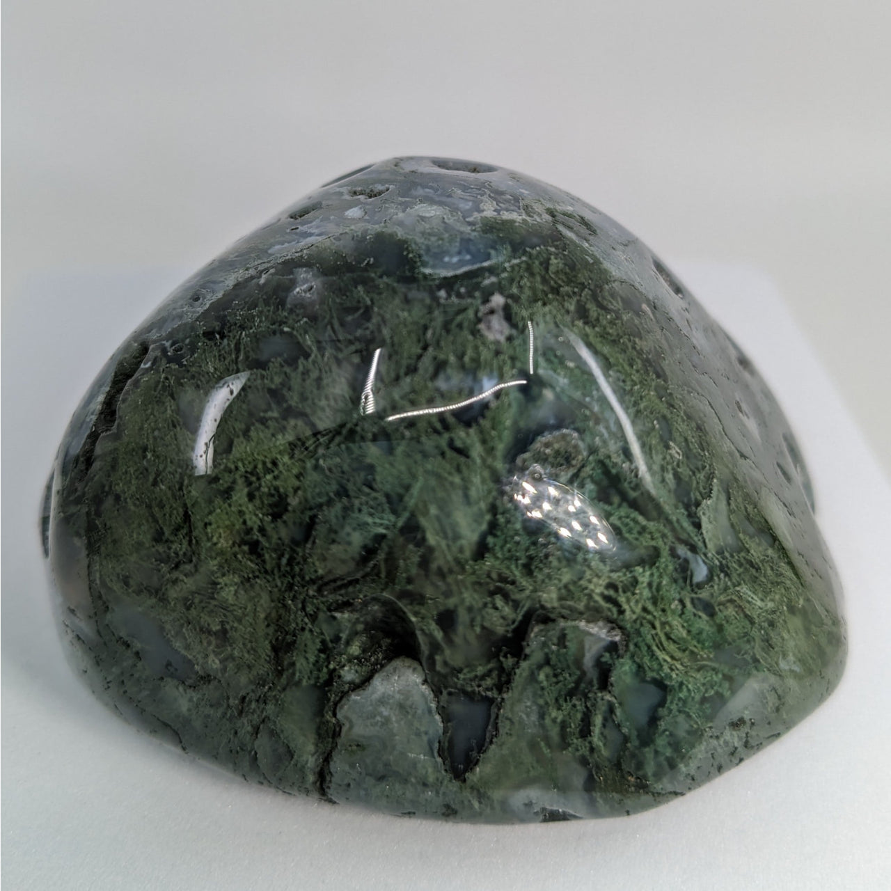 Moss Agate Touchstones #P165: A Green Rock with a White Background