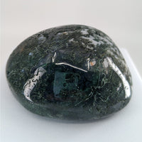 Thumbnail for Moss Agate Touchstones #P165: Green and black stone on a white background