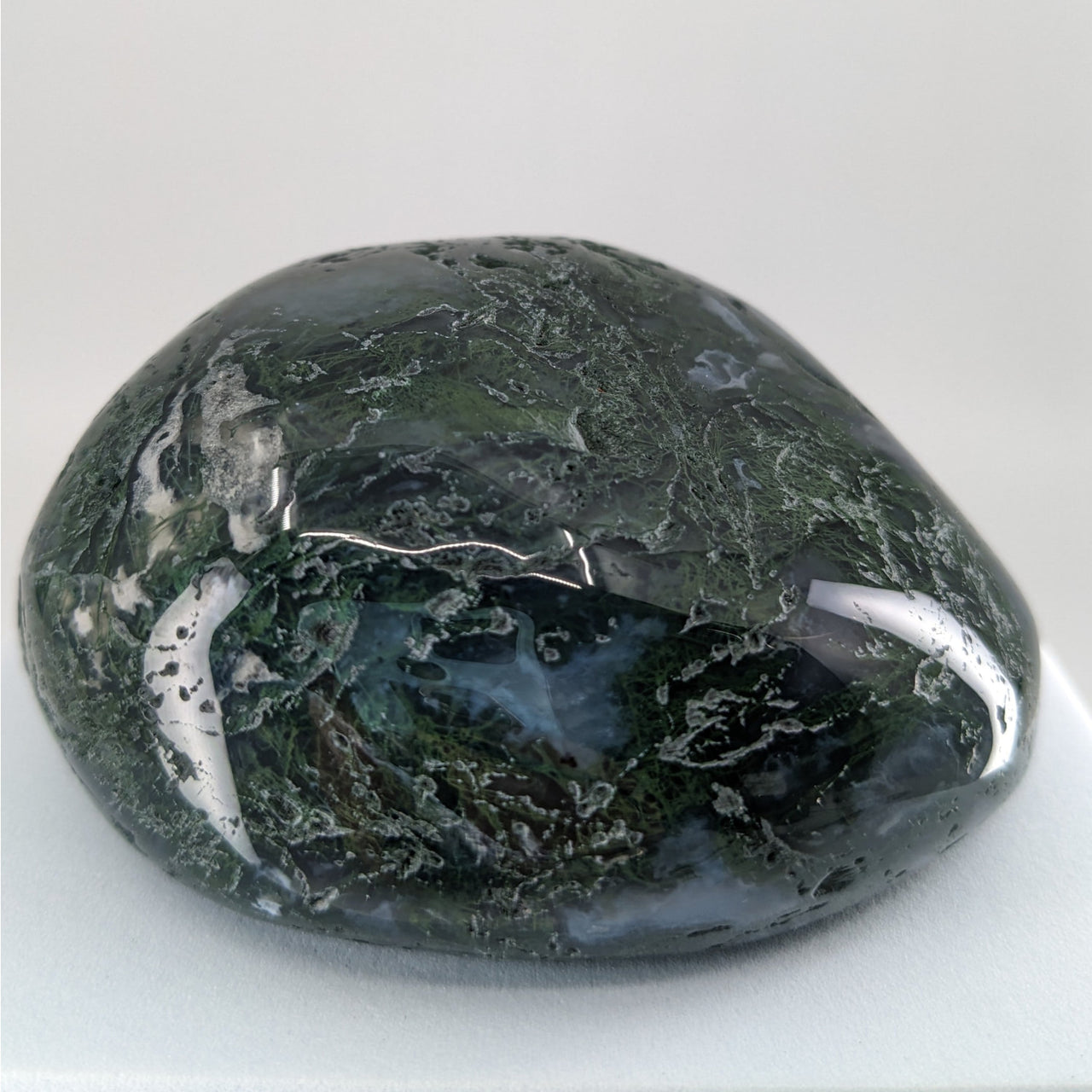 Moss Agate Touchstone P165 - Large Green and Black Stone on White Background