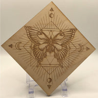 Thumbnail for Handcrafted wooden plaque featuring a butterfly and sun design from Moth Etched Wood Square Grid