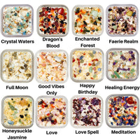 Thumbnail for A collection of different colored crystals from Peaceful Home: Crystals & Herb Energy Candles