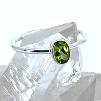 Thumbnail for Peridot Dainty Sterling Silver Stackable Ring #J518 displayed on a piece of ice