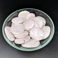 Thumbnail for Bowl of Pink Mangano Calcite Palm Stones on Black Surface - Perfect for Healing Energy