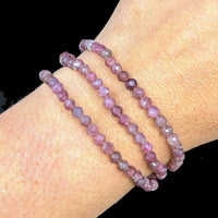 Thumbnail for A woman’s hand wearing a Pink Tourmaline 7’ Faceted 4mm Bracelet #LV1842