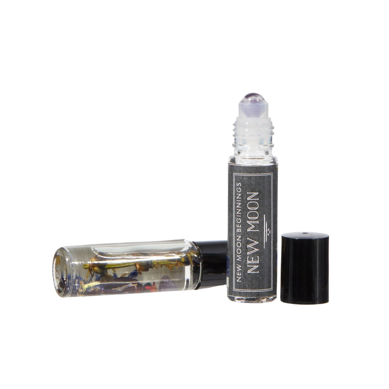 Bottle of Positive Energy Intention Roll-on Perfume with jojoba oil base and crystal infusion