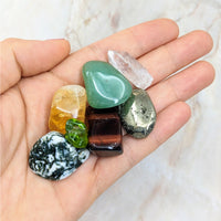 Thumbnail for Hand holding colorful gems from Prosperity Crystal Companion Set for Abundance Wealth Success