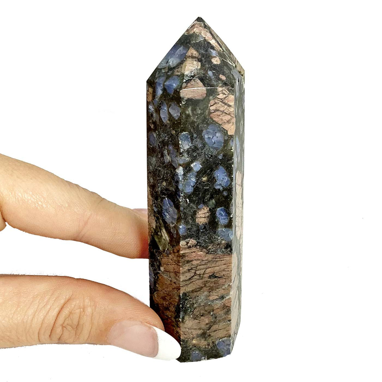 Hand holding Que Sera 4’ Tower #SK2254 blue and black quartz stone