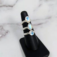 Thumbnail for Rainbow Moonstone Faceted S.S Ring #LV3912 with three stones displayed on a stand