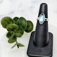 Thumbnail for Rainbow Moonstone S.S. Marquis Ring #LV3963 with blue topaz stone on a black stand