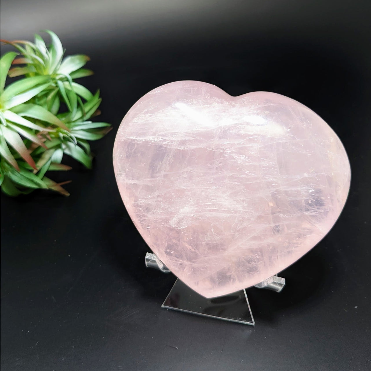 A 3.8’ pink rose quartz heart on black, product code #LV4206