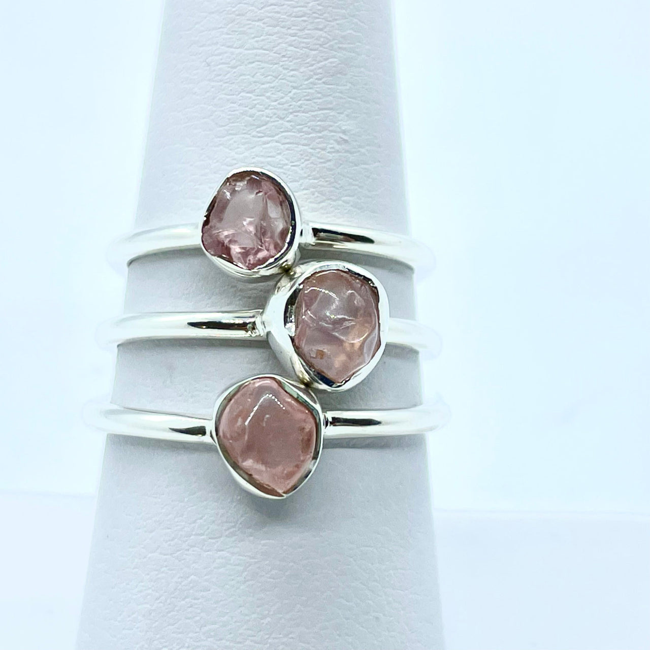 Rose Quartz Natural Dainty Stackable Sterling Silver Ring on a white napkin