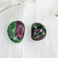 Thumbnail for Two green and purple tumbled stones on a white marble table, Ruby Zoisite 1-1.2’ #LV4055