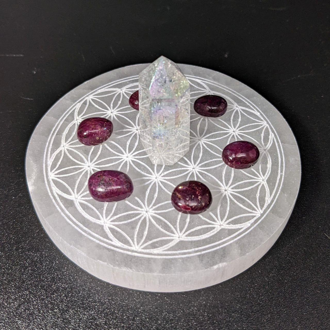 Selenite etched Flower of Life round charging plate with white quartz and purple stone