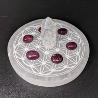 Thumbnail for Selenite etched Flower of Life round charging plate with white quartz and purple stone