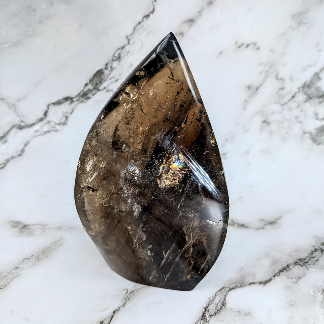 Close-up of Smoky Quartz 5.5’ Flame #LV4155 on marble surface