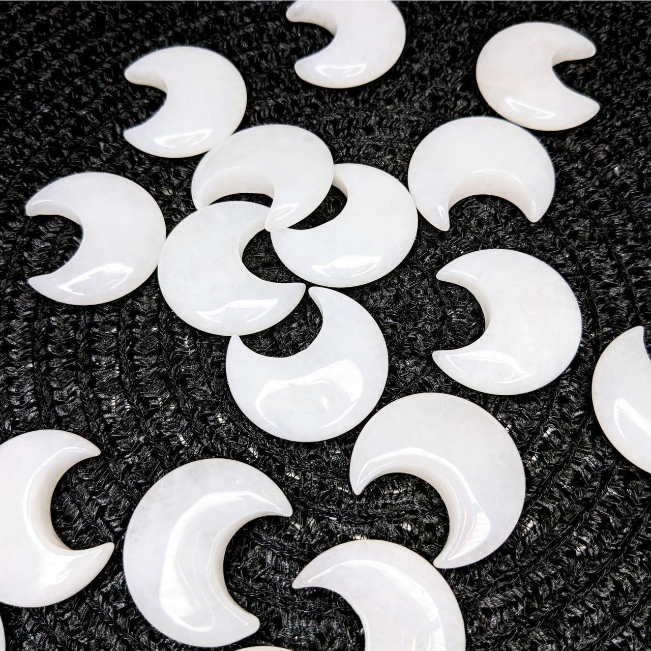 Snow Quartz Crescent Moon #LV3829 featuring a pile of white jade beads