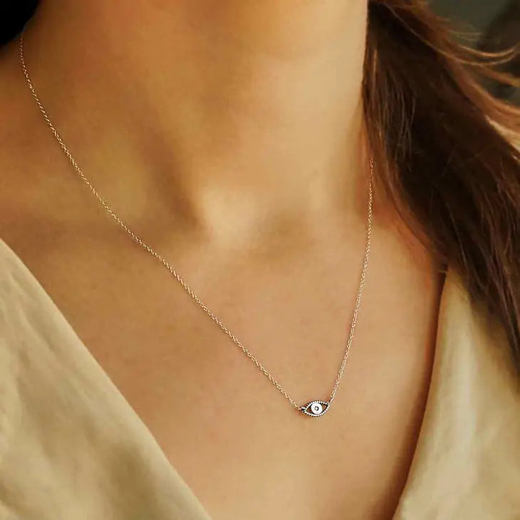 Woman wearing sterling silver necklace with gold and white diamond, #J040