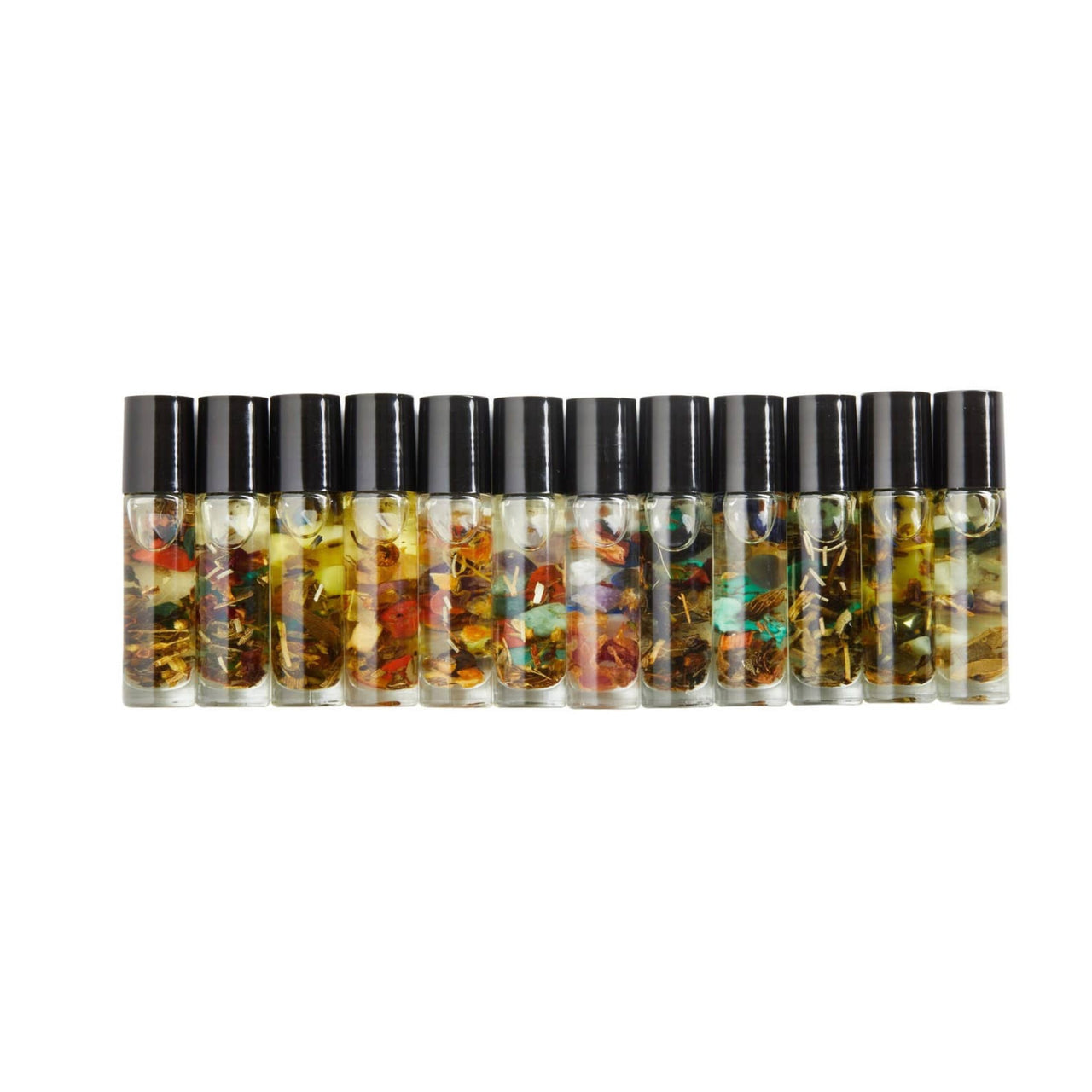 Six bottles of essential oils with organic jojoba oil and colorful crystal stones