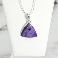 Thumbnail for Sugilite 0.75’ triangle pendant #LV2645 on a silver chain featuring a purple stone