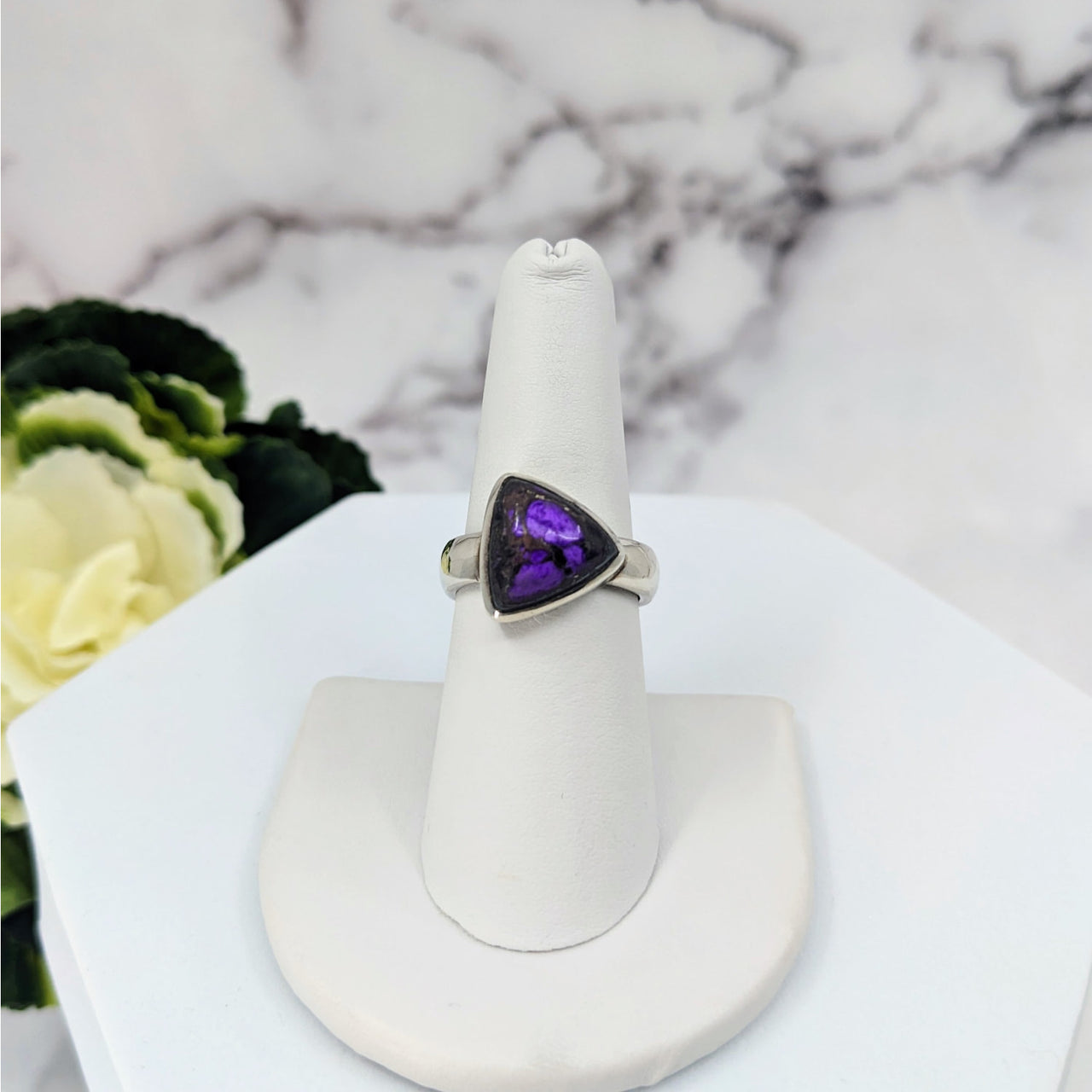 Sugilite Ring Size 7.25 Sterling Silver #LV3410 on white stand showing purple stone