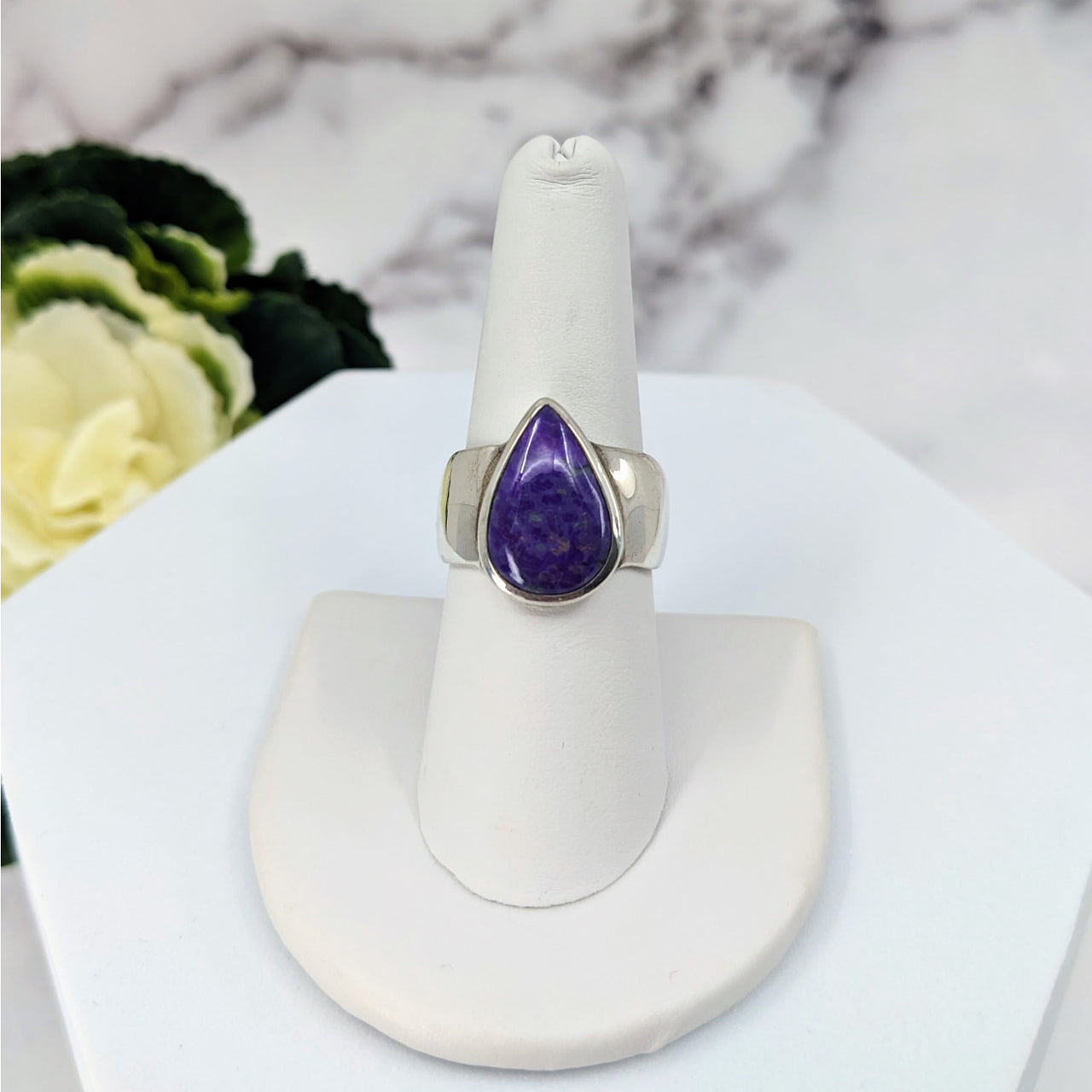 Sugilite Ring Size 7.5 Sterling Silver #LV3404 - Purple Stone Ring on White Stand