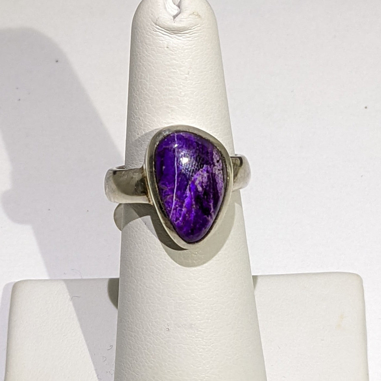 Sugilite Ring #J803 with a beautiful purple stone set in an elegant silver band