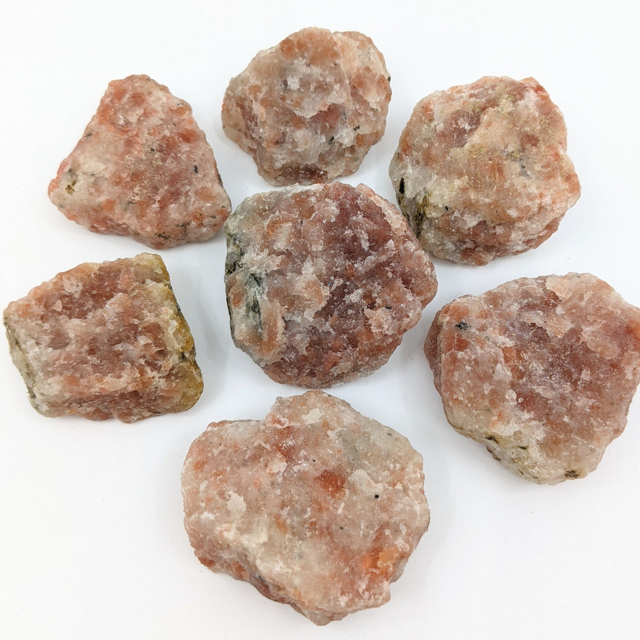 Sunstone 2’’ Rough Stone (73g) #SK9215 resembling a pile of raw meat meatballs