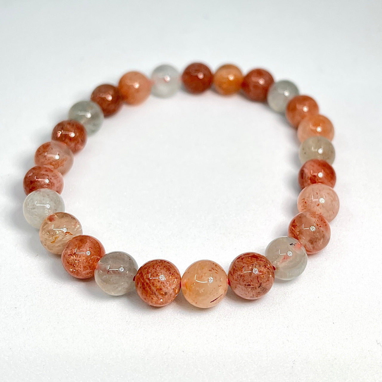 Sunstone 7’ Bracelet #SK8092 with red and white beads, honey onyx accent from Bliss Crystals