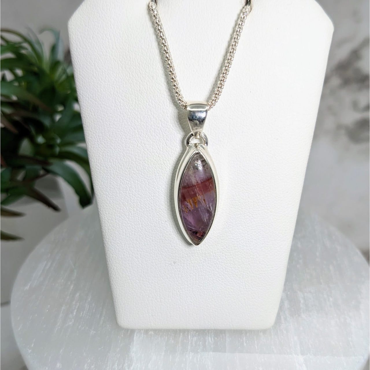 Elegant necklace with large purple stone in Super 7 S.S. Pendant #LV4356 on white mannequin