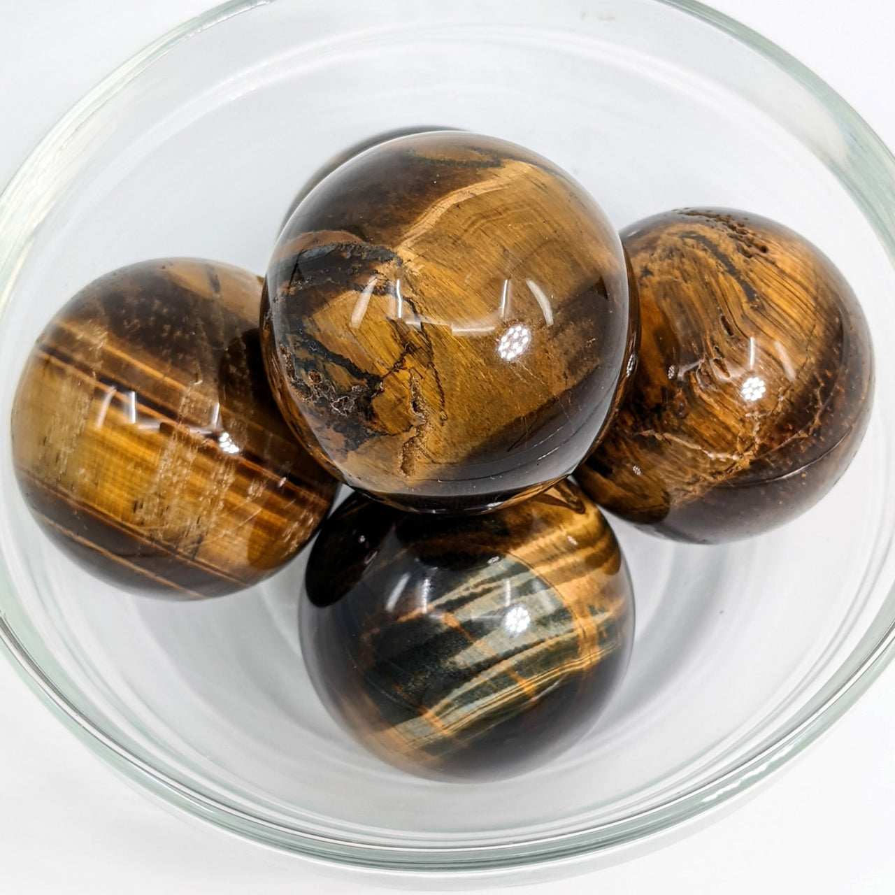 Tigers eye gems in a bowl - Tigers Eye 1.5’ Small Sphere (92g) #SK9320