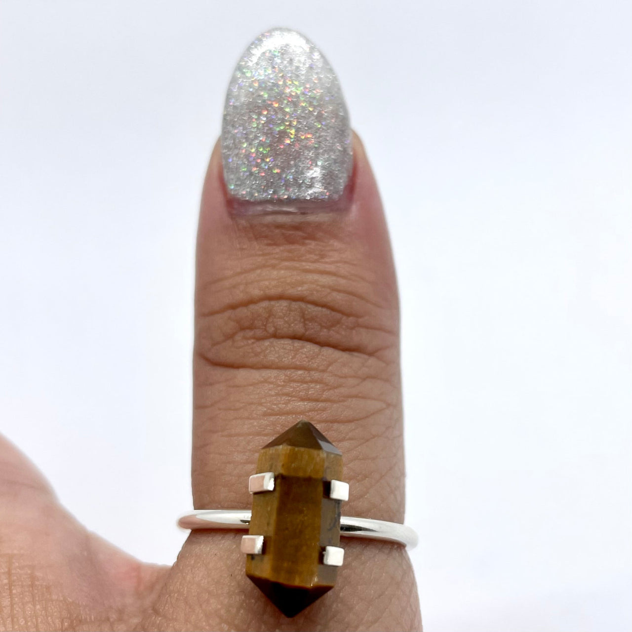 Close-up of woman’s hand wearing Tiger’s Eye Gold DT Dainty S.S. Ring #J037