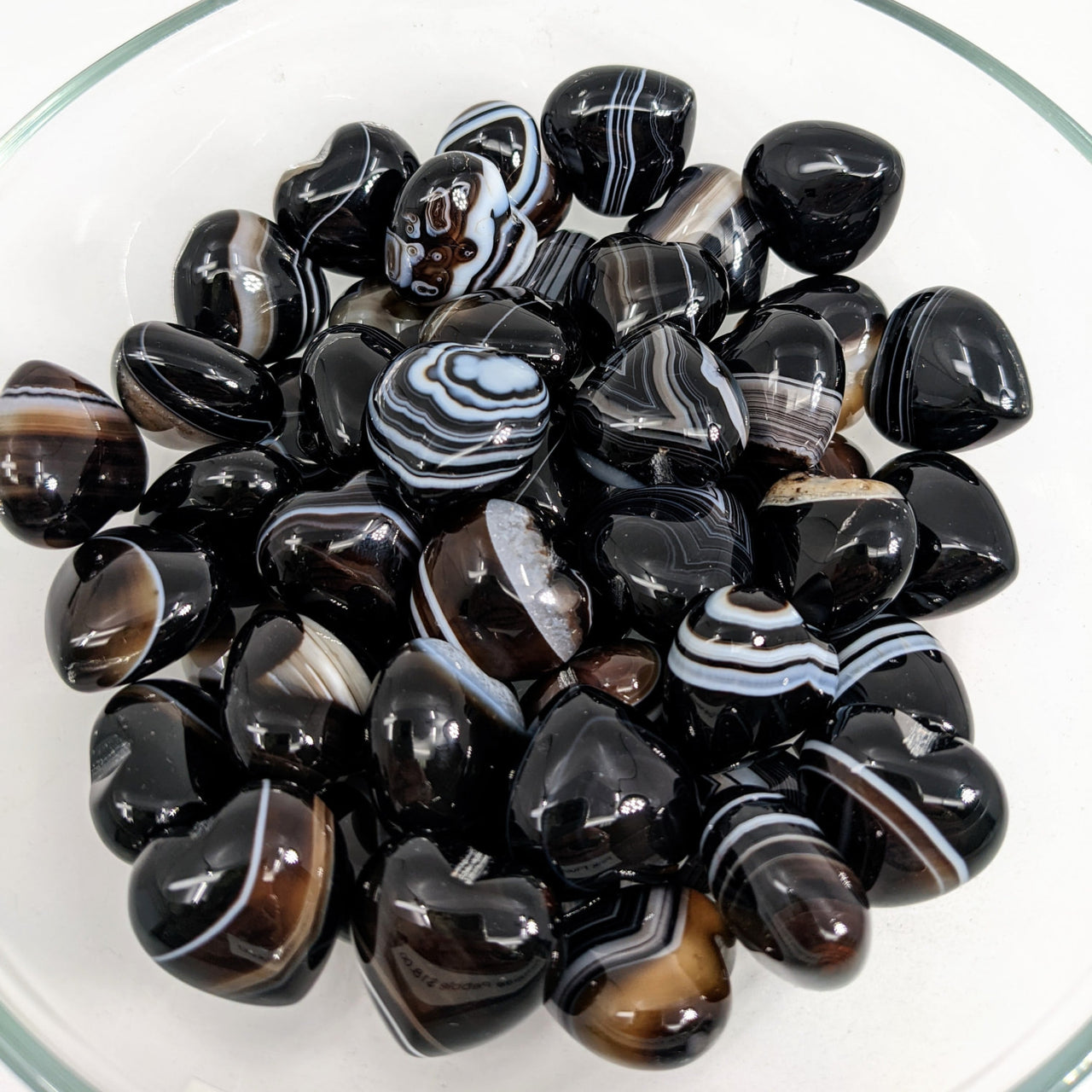 Image of Tuxedo Agate Heart (7g) #SK9000 in a bowl with black and white marbles