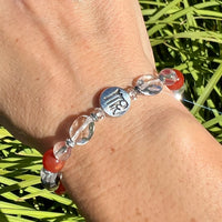 Thumbnail for Person wearing Virgo Zodiac Handmade Beaded Bracelet with red bead, 7’ Astrology Sign Jewelry