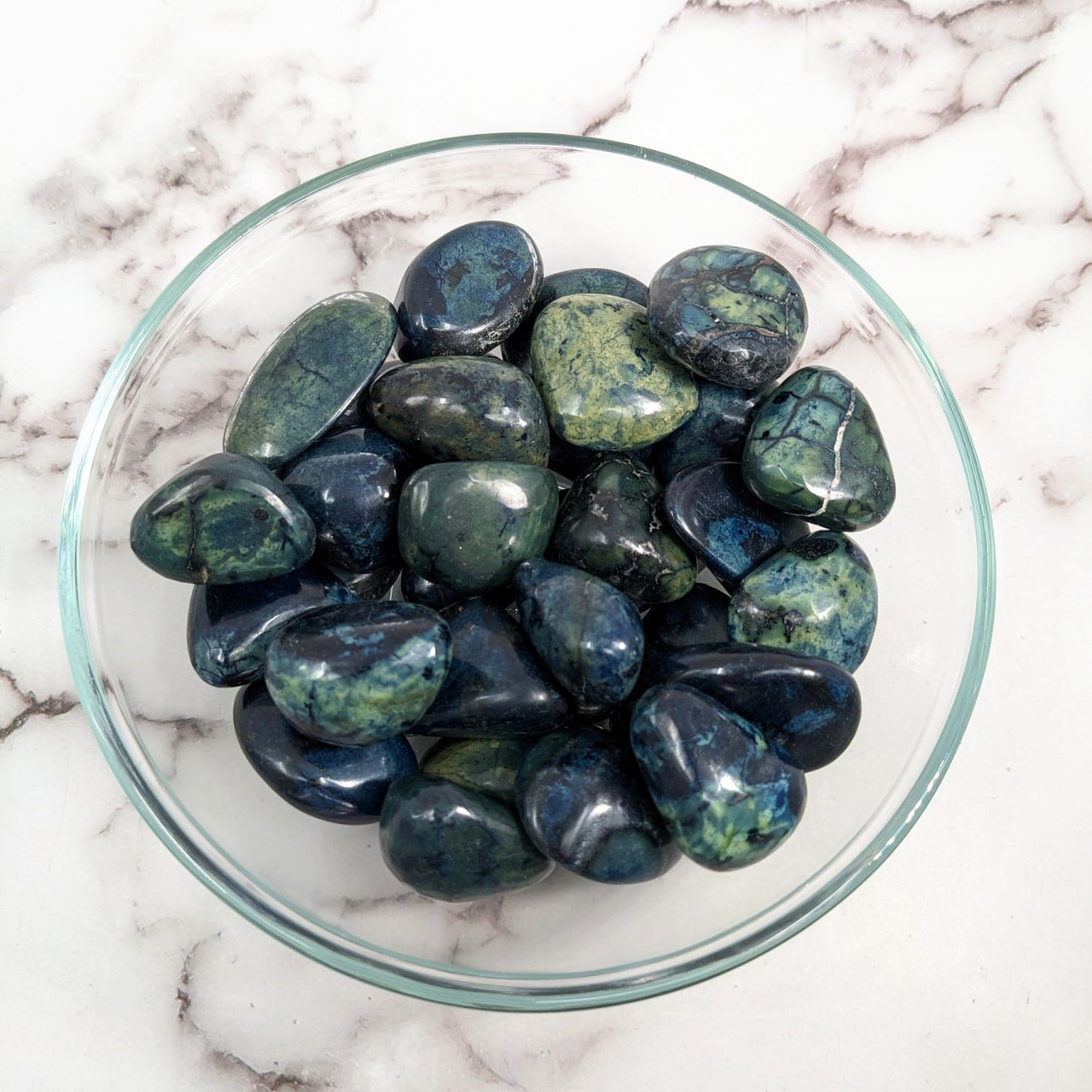 A bowl of green and blue Vivianite tumbled stones perfect for healing and decor (LV1639)