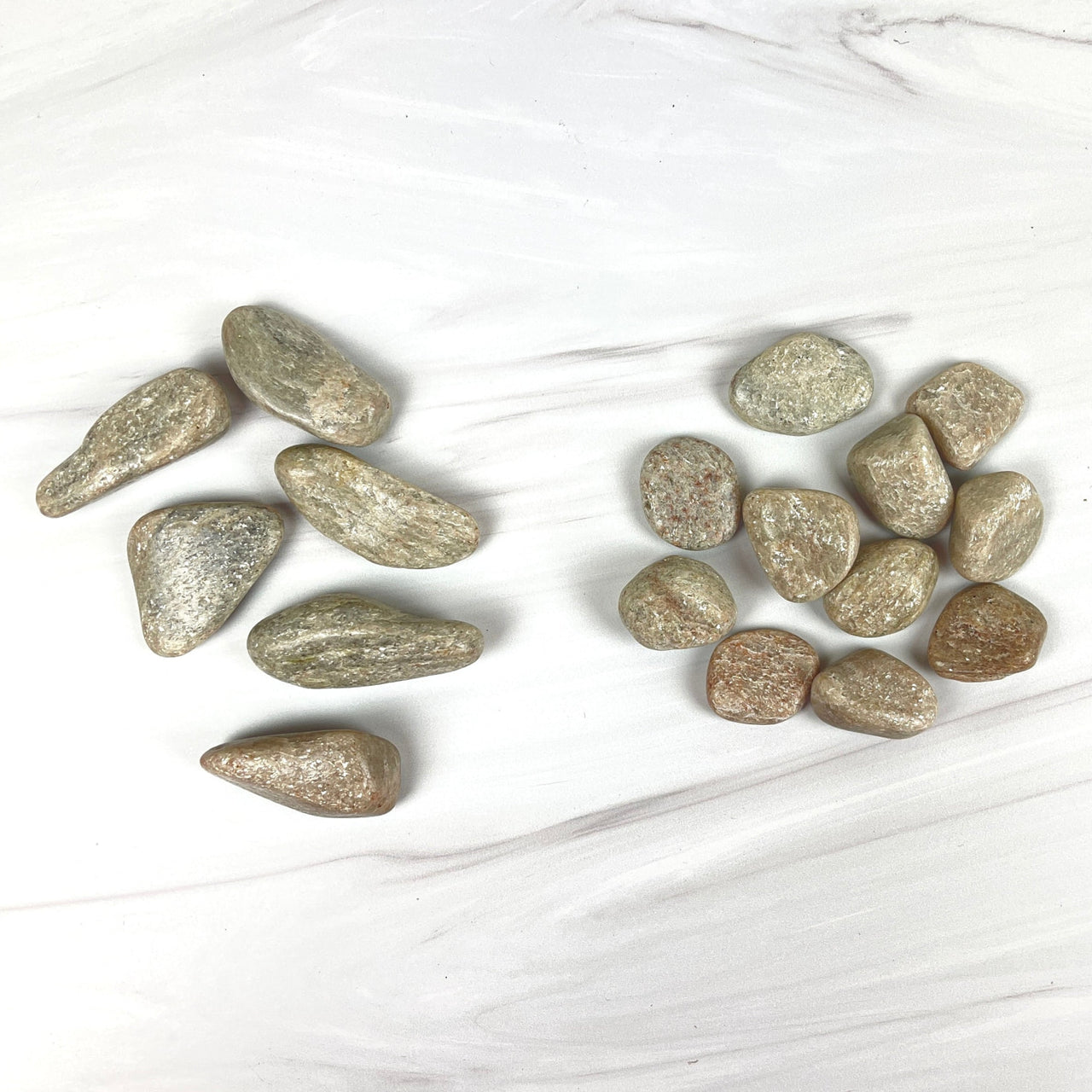 White Aventurine Tumbled Stones Pile on White Marble Background, Product #WA01