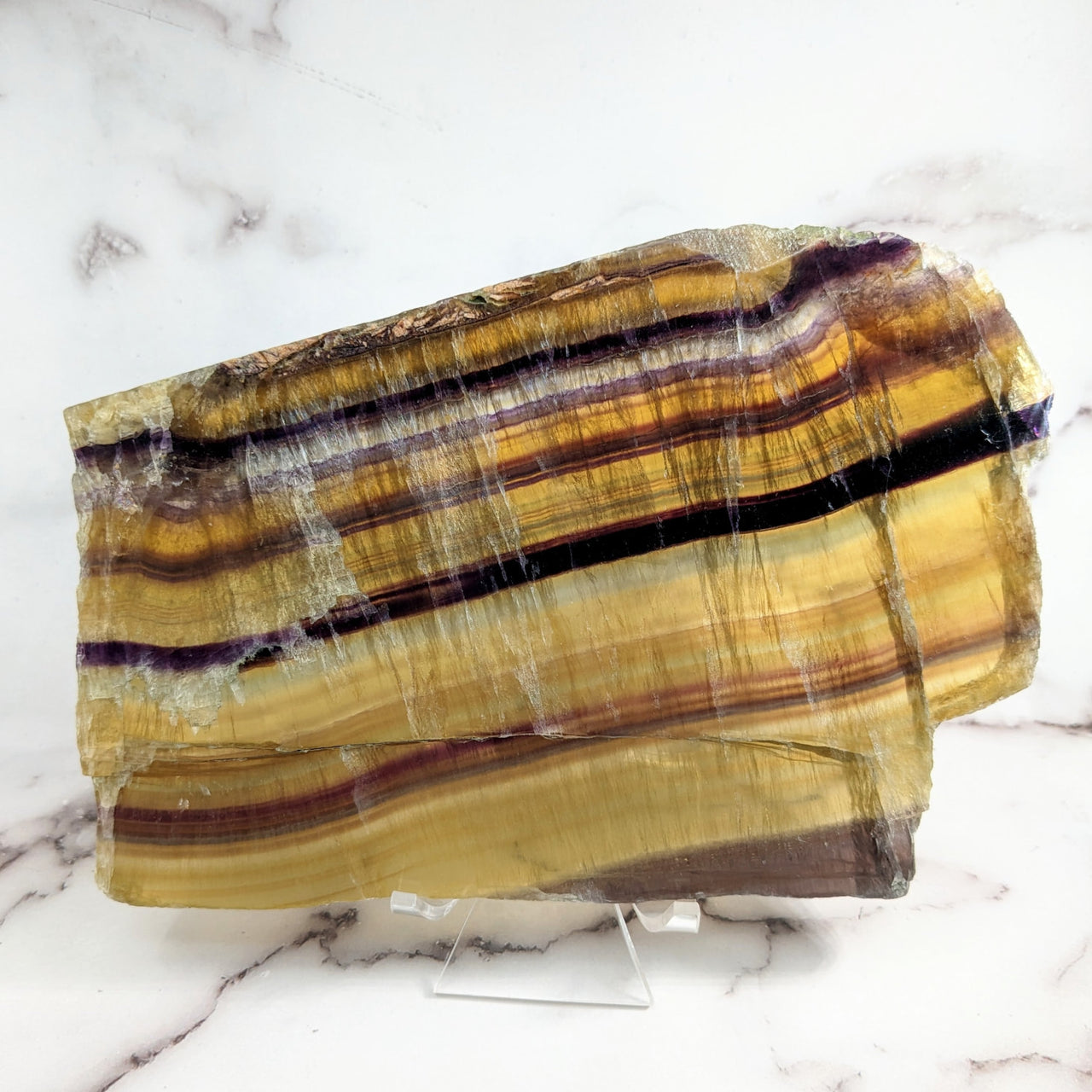 Close up of Yellow Fluorite 3.7’ Slab #SK9814 in a flat shape, yellow and purple marble pattern